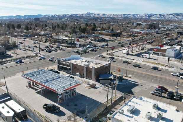 Three gas stations dot the intersection of Kipling Street and West Colfax Avenue in Lakewood on Thursday, Dec. 12, 2024. (Photo by Hyoung Chang/The Denver Post)